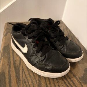 Jordan Black Low-Top Sneakers with White Swoosh